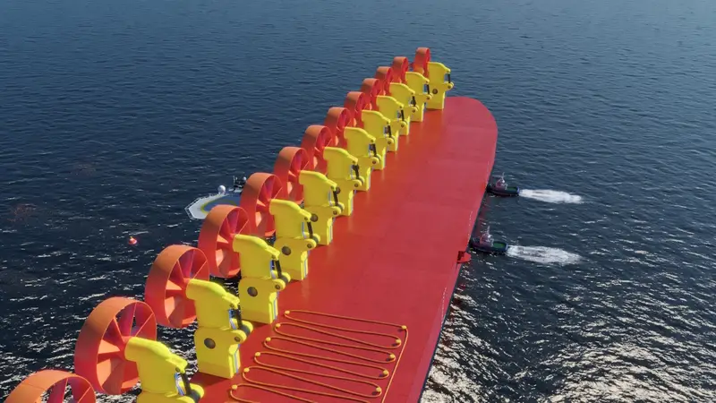 DOCGEN POWER deep ocean current generator platform — aerial view of full turbine array deployed on converted vessel at sea with support vessels alongside during positioning